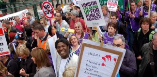 Health workers show their angry opposition to the Tory coalition’s privatisation of the NHS