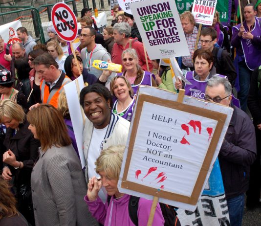 Health workers show their angry opposition to the Tory coalition’s privatisation of the NHS