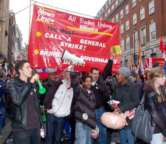 The News Line-All Trades Union Alliance banner on the March 26th 500,000-strong TUC demonstration against cuts
