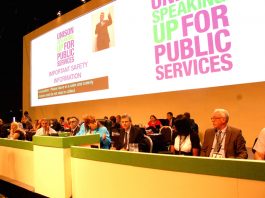 FOLLOW THE EXAMPLE OF GREEK, SPANISH AND EGYPTIAN WORKERS – say delegates to Unison conference A section of the conference platform
