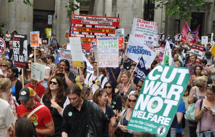 The banner of the Workers Revolutionary Party and Young Socialists  among the crowds on Thursday’s march