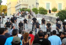 Outside the Vouli on Thursday evening – young workers stand their ground against the riot police