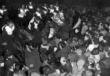 Mounted police charge at sacked printers marching to News International’s Wapping Fortress during the 1986-87 printers struggle for jobs and union rights