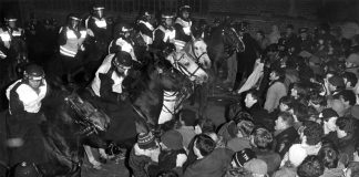 Mounted police charge at sacked printers marching to News International’s Wapping Fortress during the 1986-87 printers struggle for jobs and union rights