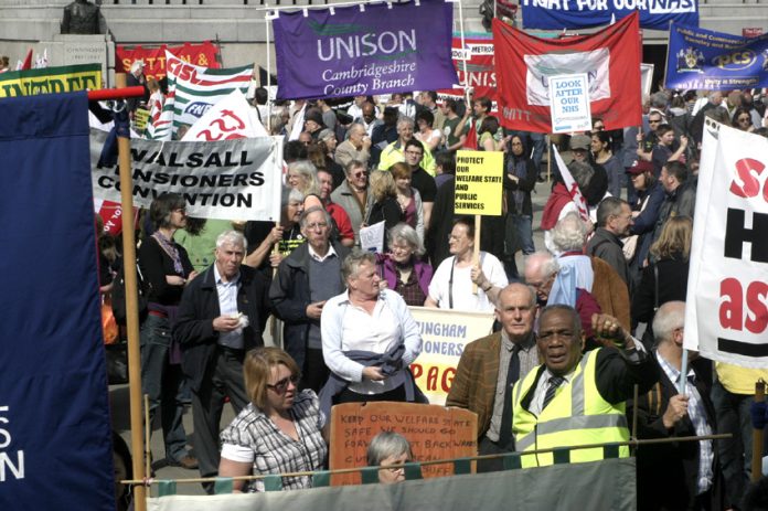 Pensioners and trade unionists at a Trafalgar Square rally. They are determined to defend all public services