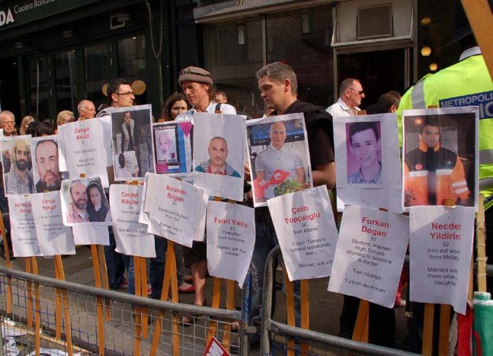 On a demonstration in London, protesters display the names of the victims killed in the attack by Israeli soldiers on the peace flotilla last year