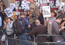 Demonstrators outside the parliamentary hearings where James and Rupert Murdoch were quizzed by MPs this week