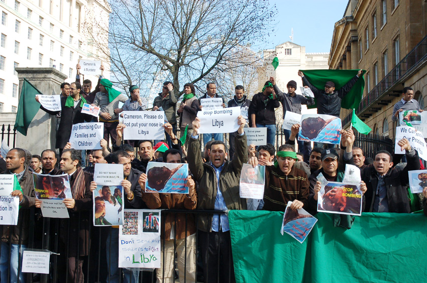 Libyan students and workers picketing Downing Street demanding the coalition stop the bombing of the Libyan people