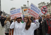 Students demonstrate against bail-outs for bankers while they are told to pay £9,000 a year tuition fees