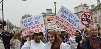 Students demonstrate against bail-outs for bankers while they are told to pay £9,000 a year tuition fees