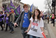 Young workers marching against the Tory-LibDem coalition. Mass sackings and cuts to services are causing mass unemployment