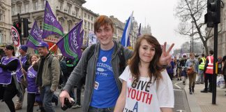 Young workers marching against the Tory-LibDem coalition. Mass sackings and cuts to services are causing mass unemployment
