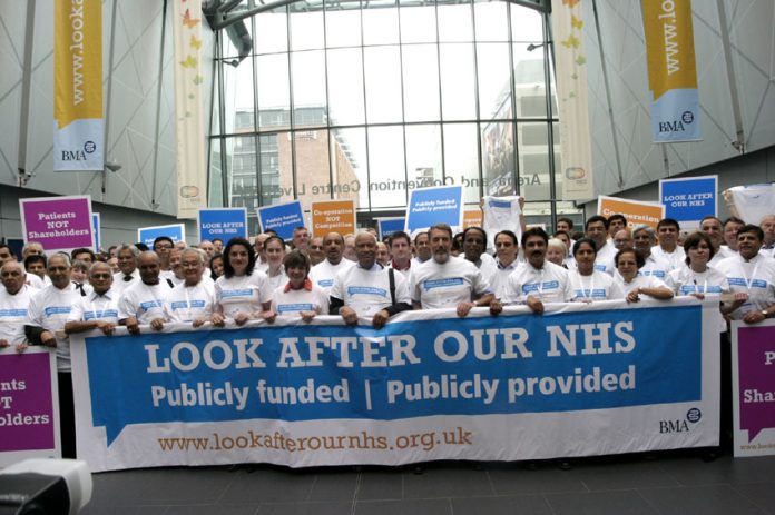 Doctors demonstrating for the National Health Service at an annual meeting of the British Medical Association