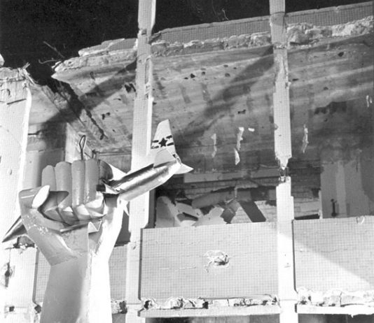 Statue erected in Tripoli of a giant Libyan fist crushing an American warplane, following the  US-UK bombing of Libya in 1986