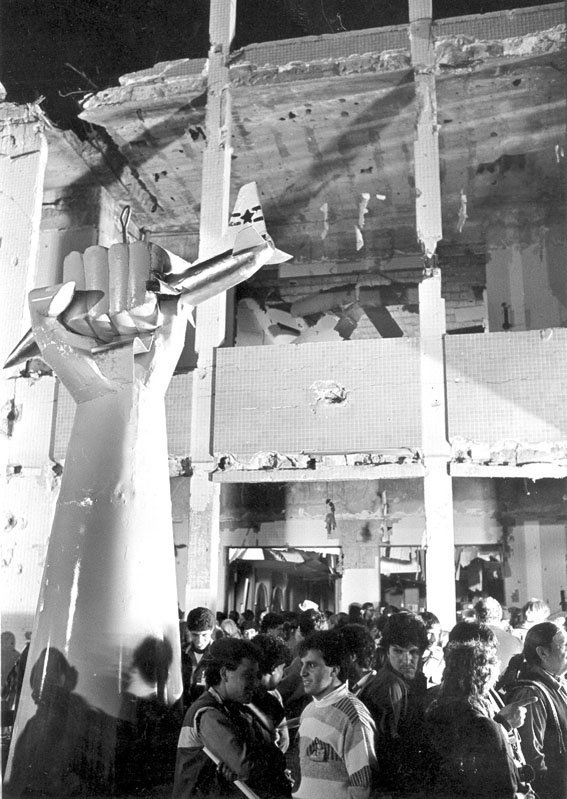 Statue erected in Tripoli of a giant Libyan fist crushing an American warplane, following the  US-UK bombing of Libya in 1986