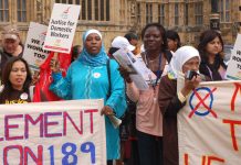 Migrant domestic workers campaigning against coalition plans to change their status outside the Houses of Parliament yesterday midday. See feature in tomorrow’s News Line