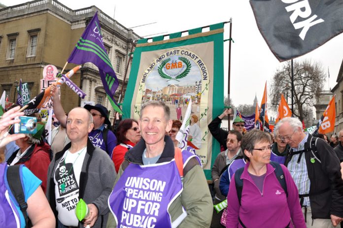 Midlands GMB members on the march against the Tory coalition government’s savage budget cuts