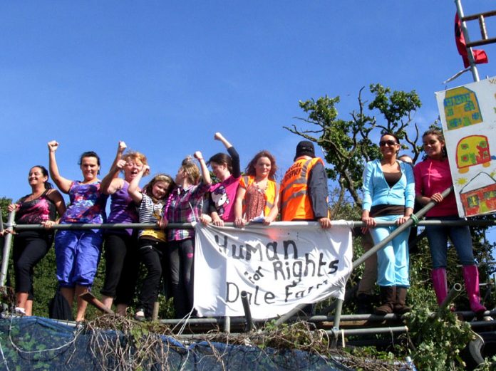 Defiant Dale Farm residents on Monday 19th September, atop the scaffolding erected to keep out the bailiffs