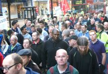 Construction workers rallying in Oxford Street yesterday morning in defence of jobs, pay and working conditions in the industry