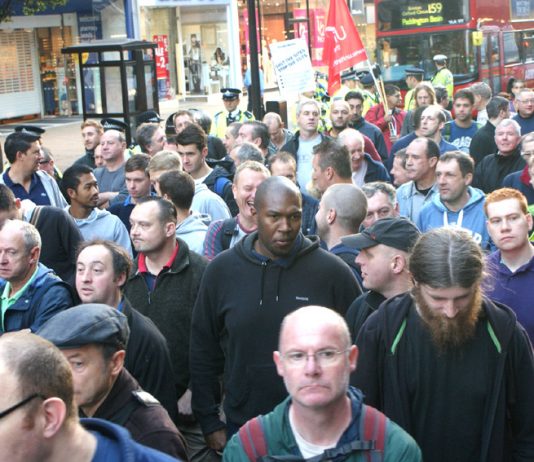 Construction workers rallying in Oxford Street yesterday morning in defence of jobs, pay and working conditions in the industry