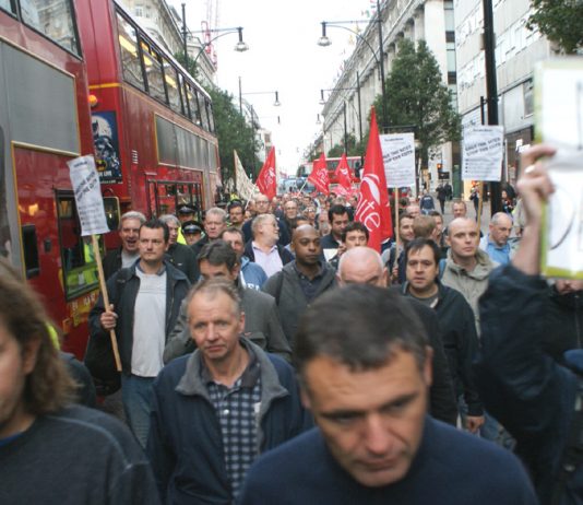 Construction workers march down Oxford Street on Wednesday morning