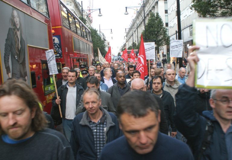 Construction workers march down Oxford Street on Wednesday morning