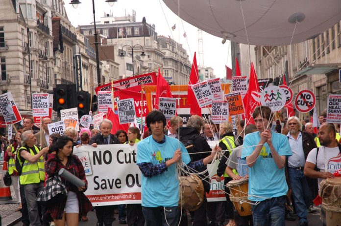 Youth and workers marching through central London against the Coalition’s Health and Social Care Bill in July