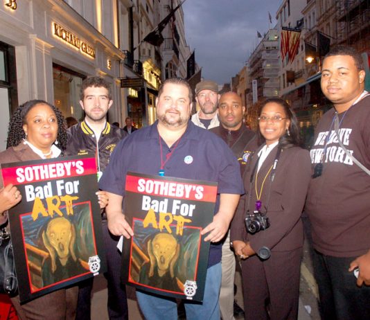 Teamsters Local 814 members and Transport Workers Union Local 100 members outside Sotheby’s in New Bond Street on Thursday night