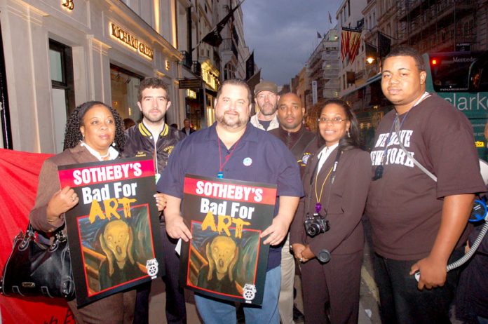 Teamsters Local 814 members and Transport Workers Union Local 100 members outside Sotheby’s in New Bond Street on Thursday night