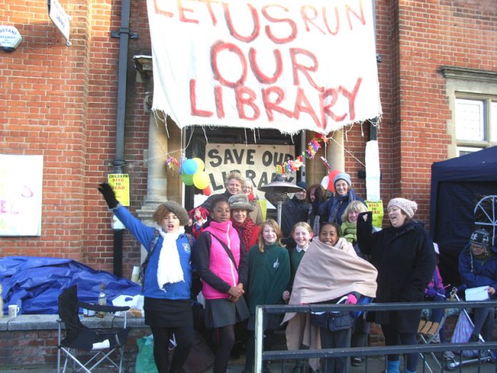 Save Kensal Rise Library campaigners were joined by local children outside the library yesterday morning