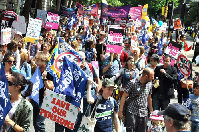 Striking civil servants, school teachers and college lecturers on the march to defend pensions in June this year