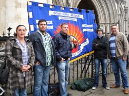 FBU members with their banner outside the High Court in London yesterday morning