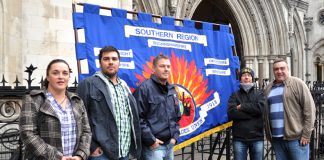 FBU members with their banner outside the High Court in London yesterday morning