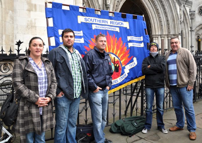 FBU members with their banner outside the High Court in London yesterday morning