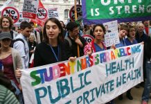 Student nurses marching last May in defence of the NHS