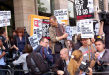 Protesters outside the Culture Committee in July as Rupert Murdoch appeared