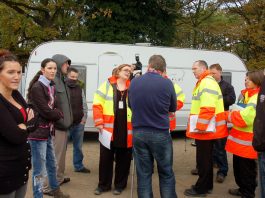 Residents confront council officers with their eviction orders on Wednesday