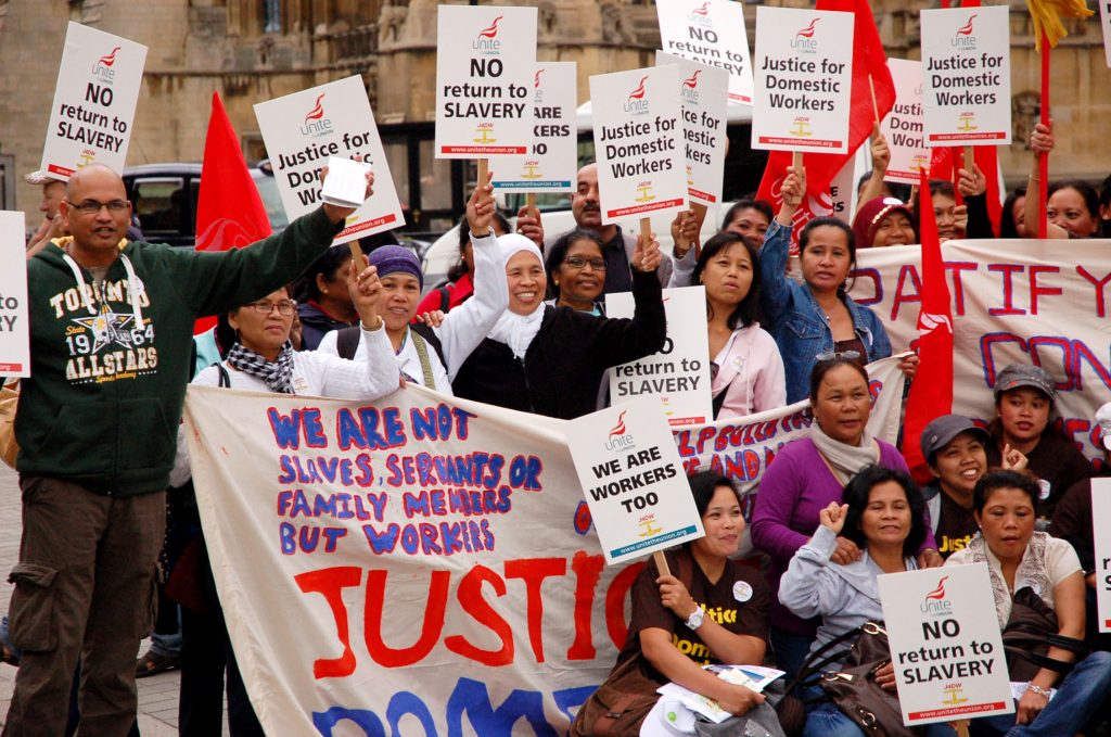 Domestic workers demonstrating outside Parliament demanding ‘No return to slavery’