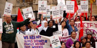 Domestic workers demonstrating outside Parliament demanding ‘No return to slavery’