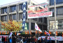 The DEH Computer Centre building under occupation. Banners state ‘We resist’ and ‘We will not cut off the electricity supply to the poor even if they put us in prison’ – signed by the DEH trades union