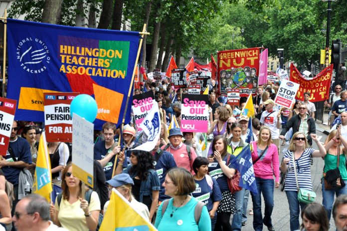 Trade unionists demonstrating against pension cuts on June 30 – Workers are being threatened with new anti-union laws if they strike on November 30
