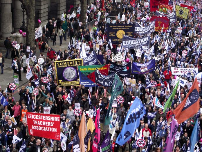 Large numbers of teachers took part in the 500,000-strong TUC demonstration on March 26 – hundreds of thousands of teachers will be on strike on tomorrow