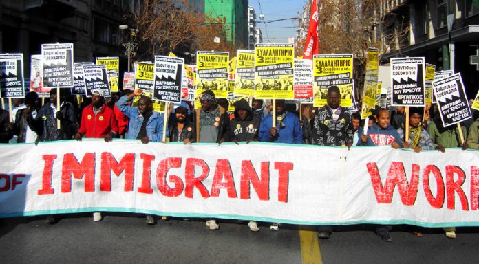 Immigrant workers marching in Athens during Thursday’s one-day strike