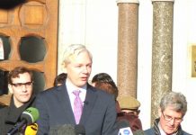 JULIAN ASSANGE on the step of the High Court after winning his right to appeal to the Supreme Court