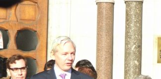JULIAN ASSANGE on the step of the High Court after winning his right to appeal to the Supreme Court