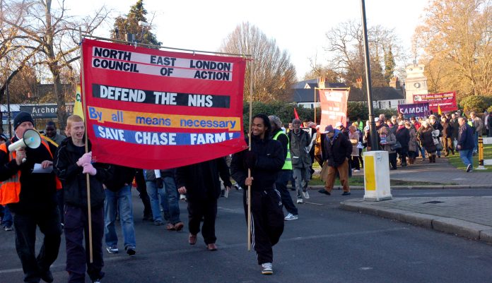 The North East London Council of Action ‘Save Chase Farm’ march sets off from the war memorial