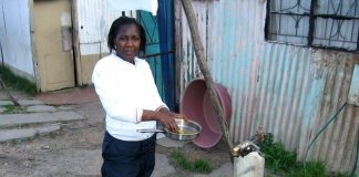 A stand-up tap is the only washing facility for thousands of South Africans