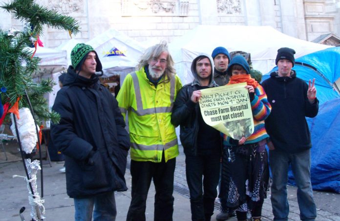 Occupiers outside St Paul’s show their support for the daily picket to prepare the occupation of Chase Farm Hospital