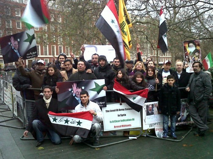 Syrians demonstrating outside the US embassy in London against a NATO intervention in their country