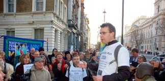 Consultant CLIVE PEEDELL addressing the crowd outside Richmond House in Whitehall, London, yesterday